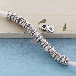 30 of Karen Hill Tribe Silver Imprinted Disc Spacer Beads 5x1mm. :ka4248