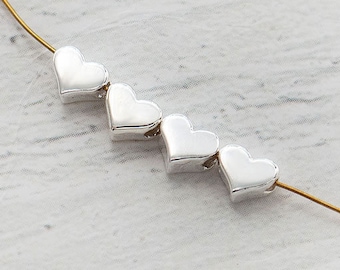 4 of 925 Sterling Silver Tiny Heart Beads 5x4mm.  Hole 1.2 mm. :th2068m