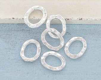 6 of Karen Hill Tribe Silver Hammered Oval Closed Jump Rings 8.5x10.8 mm. :ka2978