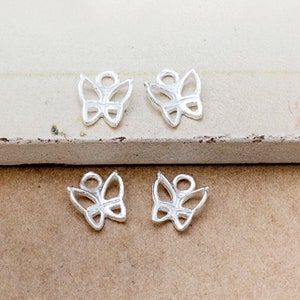 4 of 925 Sterling Silver Small Butterfly Charms 6.5 mm. :tm0240