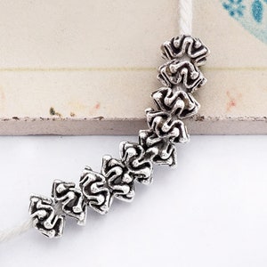 10 of Karen Hill Tribe Silver Bi-crown Beads 7.5x4 mm. :kp0699