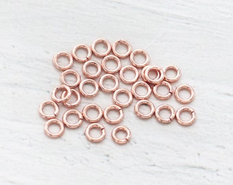30 of 925 Sterling Silver Rose Gold  Vermeil Style Opened Jump Rings  3x0.7mm. :pg0554