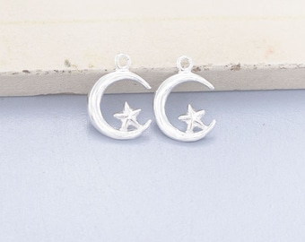 May include: Two silver crescent moon charms with a star inside each moon. The charms are perfect for jewelry making or adding to crafts.