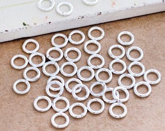 50 of 925 Sterling Silver Closed Jump Rings 5 mm.,  #18 AWG.  :th0318