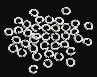 40 of 925 Sterling Silver Opened Jump Rings 4 mm. :th1006