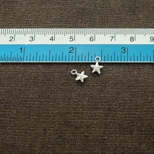 10 of 925 Sterling Silver Star Charms 6 mm. :th0744 image 3