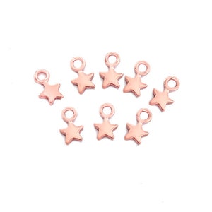10 of 925 Sterling Silver Rose Gold Vermeil Style Star Charms 4mm. Tiny charms   :pg0848
