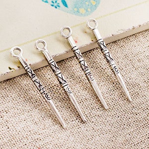 4 of Karen Hill Tribe Silver Imprinted  Spike Pendants  2x30mm. :ka4371