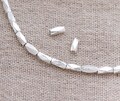 20 of Karen Hill Tribe Silver Faceted Oval Beads 2.5x5.5mm. :ka4472 product logo