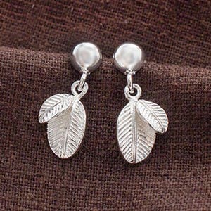 1 pair of 925 Sterling Silver Half Ball With Leaf Stud Earrings . Polish Finished.  :er1105