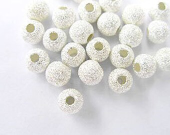 20 of 925 Sterling Silver Stardust Beads 4 mm. :th0790