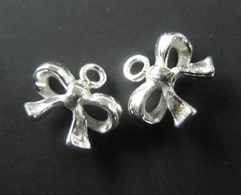 2 of 925 Sterling Silver Bow Charms 8x11 mm. :th1612 image 1