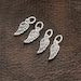 Tiny Textured Angel Wing Charm Necklace In Sterling Silver - Hypoallergenic Gift