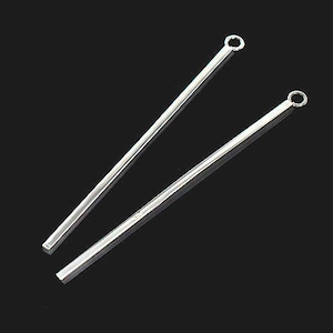 May include: Two silver metal rods with a small loop at the end of each rod.