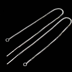 May include: Two silver chain earring extenders with a jump ring at one end and a straight post at the other end.