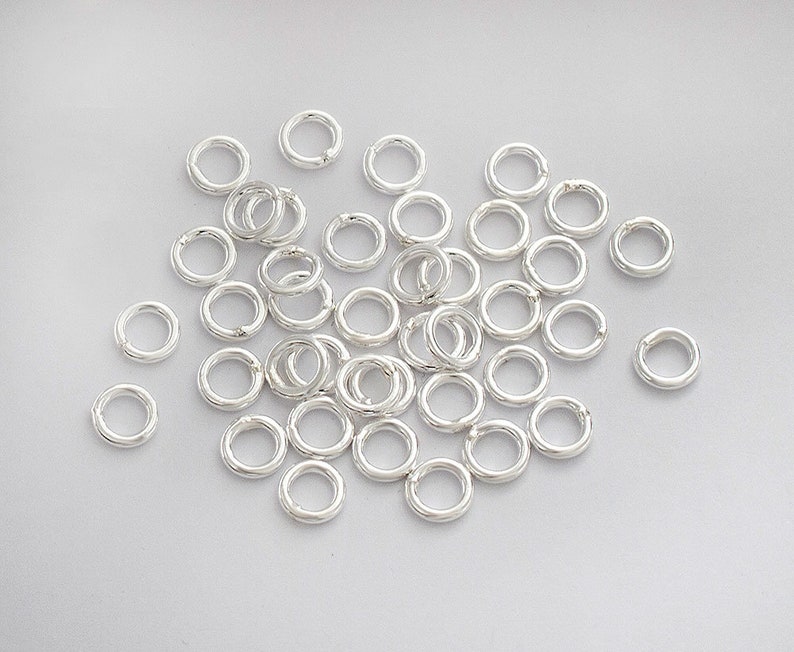 50 of 925 Sterling Silver Closed Jump Rings 5 mm., 18 AWG. :th0318 image 5