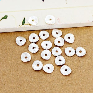 20 of Karen Hill Tribe Silver Curve Disc Beads 6x0.8 mm. :ka4260