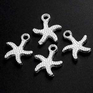 4 of 925 Sterling Silver Starfish Charms 9mm. :th2386
