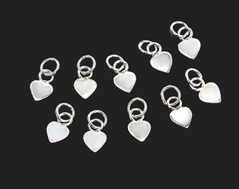 10 of 925 Sterling Silver Little Heart Charms 4mm. :th2667