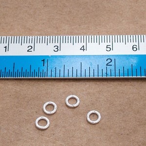 50 of 925 Sterling Silver Closed Jump Rings 5 mm., 18 AWG. :th0318 image 4