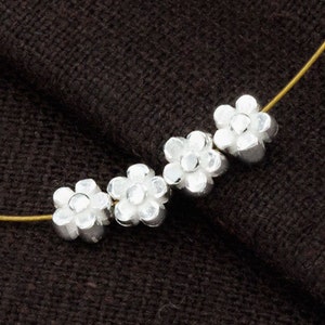 4 of 925 Sterling Silve Little Flower Beads 4.5mm. :th2462