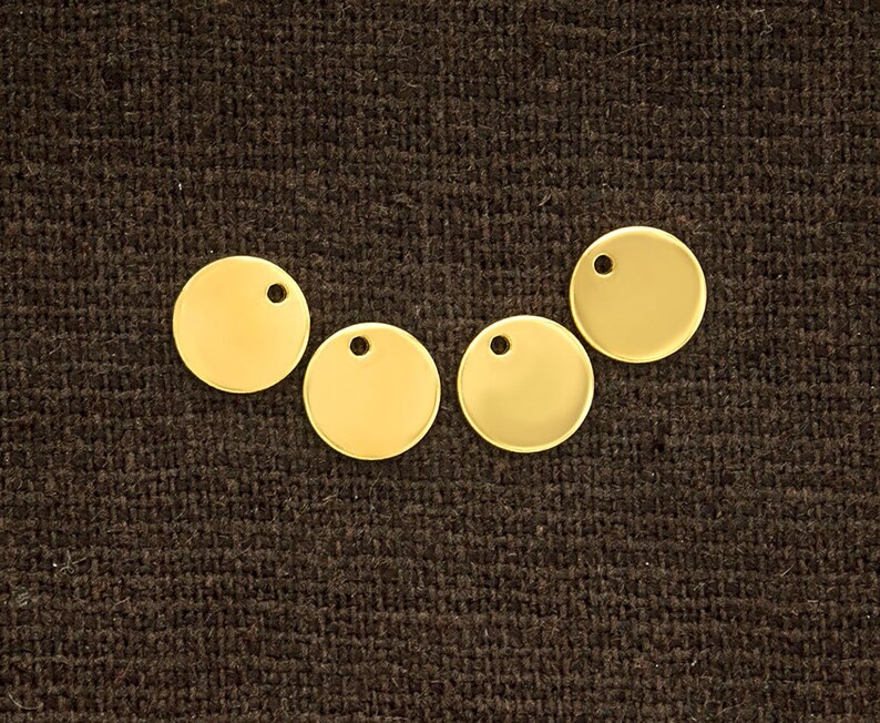 925 Sterling Silver 24k Gold Vermeil Style 4 Round Disc Tag Charms 6 mm. 925 Sterling Silver 24k Gold Vermeil Style 4 Round Disc Tag Charms 6 mm.