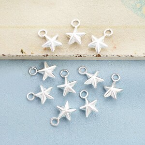 10 of 925 Sterling Silver Star Charms 6 mm. :th0744 image 2