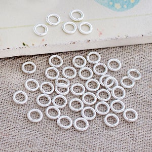 50 of 925 Sterling Silver Closed Jump Rings 5 mm., 18 AWG. :th0318 image 2