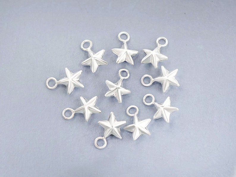 10 of 925 Sterling Silver Star Charms 6 mm. :th0744 image 4