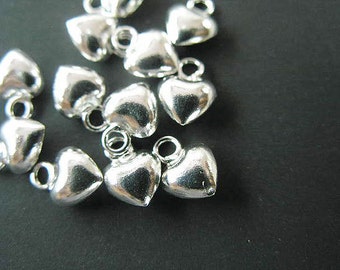10 of 925 Sterling Silver Heart Charms 5 mm. :th0131