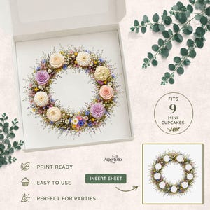 Pode incluir: Uma caixa branca com um design de coroa de flores. A coroa é composta por várias flores e vegetação em tons pastel. O texto "FITS 9 MINI CUPCAKES" está em um círculo. O texto adicional inclui "PRINT READY", "EASY TO USE" e "PERFECT FOR PARTIES".
