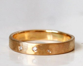 Ring aus fairen Gold, rosé 750 mit 3 Brillanten