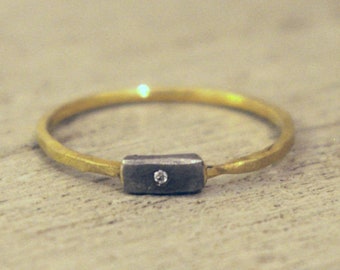 Gouden ring "forever" met briljant in palladium