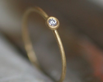 delicate , elegant fair trade engagement ring , Fairmined 18k gold, thin wedding or friendship band with ethical sourced diamond