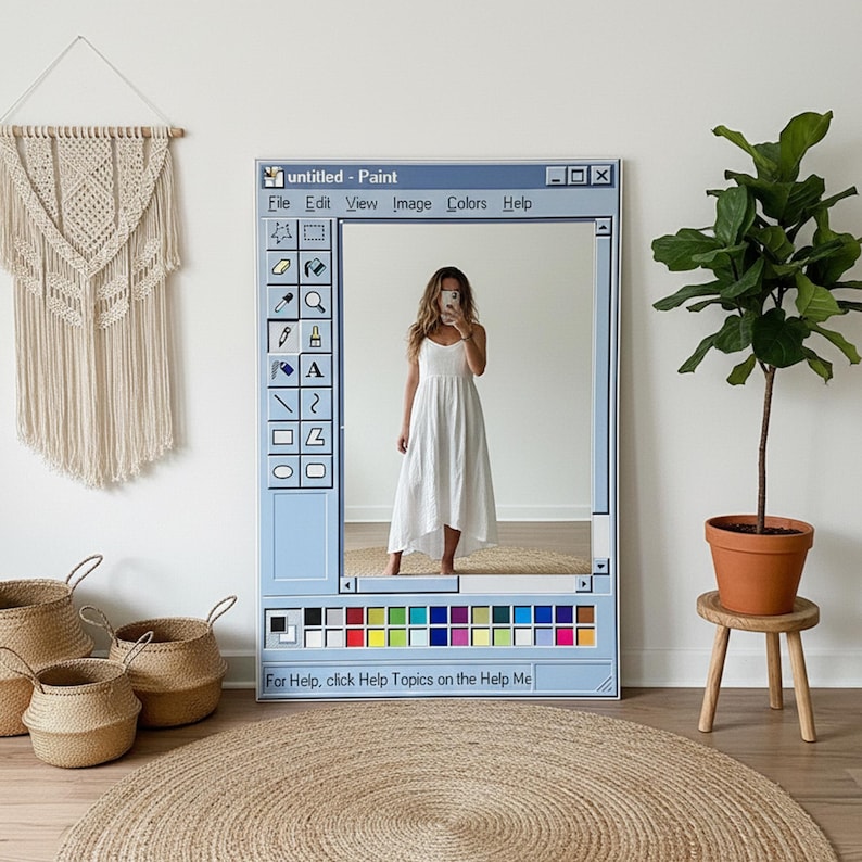 May include: A large, rectangular mirror designed to resemble the classic Windows Paint program interface. The mirror is framed in light blue and features the program's title bar, icons, and color palette. The text "untitled - Paint" is visible. A woman in a white dress is reflected in the mirror.