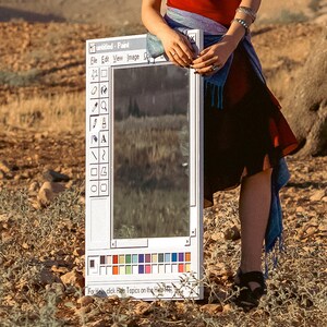 May include: A white framed mirror designed to resemble the classic Microsoft Paint application interface. The mirror includes the "untitled - Paint" title bar, menu options, and a toolbar with various drawing tools. The bottom features a color palette.