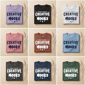 May include: Nine folded t-shirts in various colors, including lavender, black, white, rose, brown, light blue, charcoal, navy, and green. Each shirt features the text "PRINTIFY X PRINTFUL CREATIVE MOCKS" in a bold, stylized font.