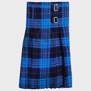 May include: A blue tartan kilt with a classic plaid pattern in shades of blue, black, and red. The kilt features two silver buckles and pleats. This traditional garment is suitable for formal occasions.