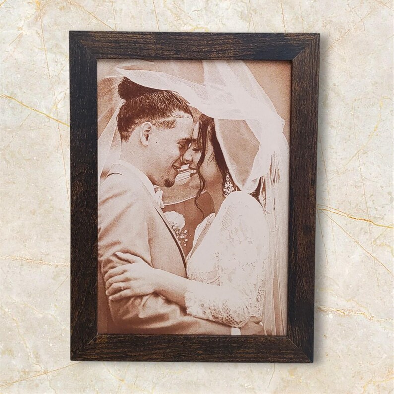 Photograph engraved into leather for a 3rd and 9th anniversary gift.