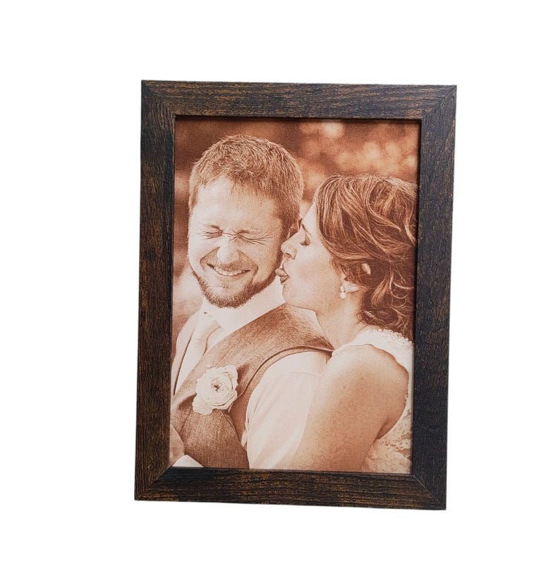 Photograph engraved into leather for a 3rd and 9th anniversary gift.