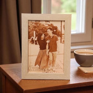 Photograph engraved into leather for a 3rd and 9th anniversary gift.