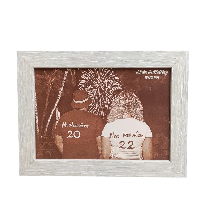 Photograph engraved into leather for a 3rd and 9th anniversary gift.