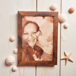 Photograph engraved into leather for a 3rd and 9th anniversary gift.