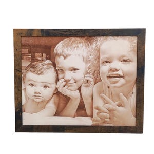 Photograph engraved into leather for a 3rd and 9th anniversary gift.