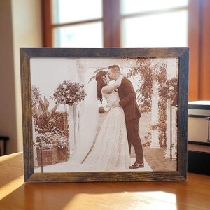 Photograph engraved into leather for a 3rd and 9th anniversary gift.