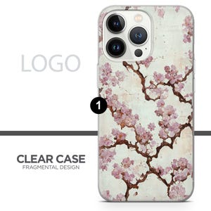 May include: Clear phone case with a floral design. The case features a light background with brown branches and pink blossoms. The text "CLEAR CASE FRAGMENTAL DESIGN" is visible.