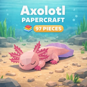 Puede incluir: Un ajolote de papel de baja poli en rosa, melocotón y morado, descansando sobre un fondo marino arenoso. La imagen incluye el texto "Axolotl Papercraft" y "97 piezas". El fondo presenta plantas acuáticas, rocas y burbujas.
