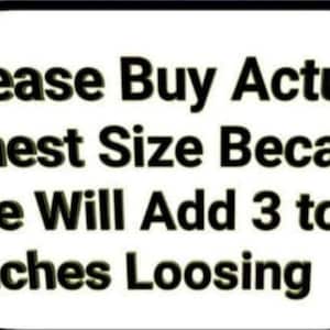 May include: A white rectangular sign with a black border and text that reads "Please Buy Actual Chest Size Because We Will Add 3 to 6 Inches Loosing" on a light blue background.