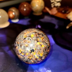 Enchanting Yoperlite Sphere - Handcrafted Fluorescent Crystal for Energy Work and Decor