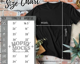 Könnte beinhalten: Ein schwarzes Bella + Canvas 3001 Unisex T-Shirt mit einer Größentabelle. Die Tabelle zeigt Maße für die Größen XS bis 5XL, mit Längen von 68.58cm bis 88.9cm und Breiten von 41.91cm bis 81.28cm.